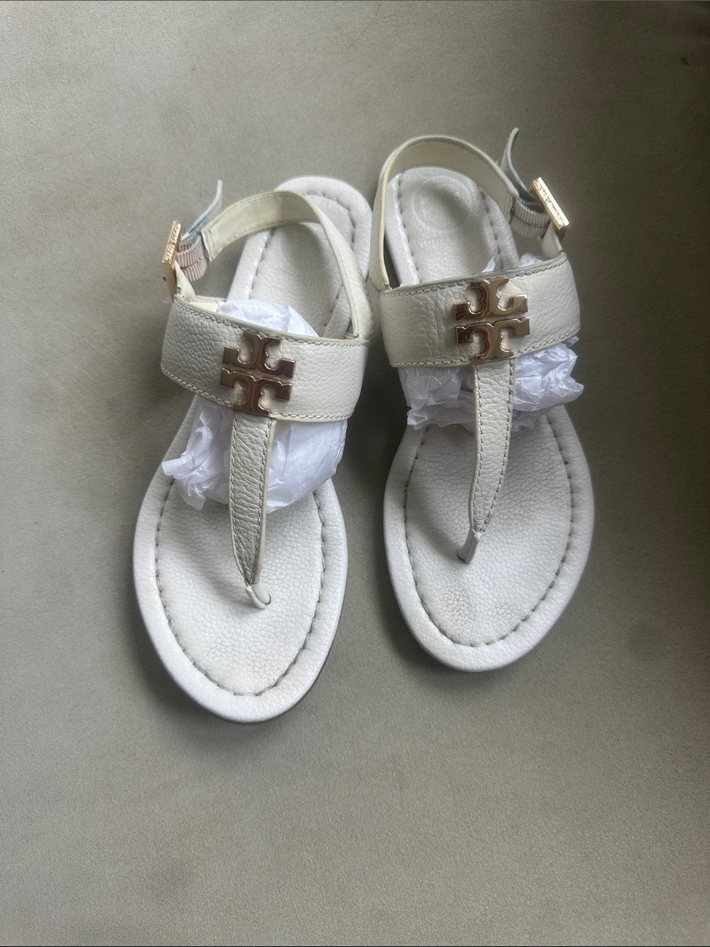 Tory Burch women’s Cream Leather Logo T-Strap Sandals
